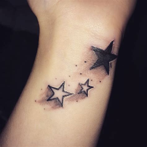 tattoo stars on wrist|star wrist tattoos for women.